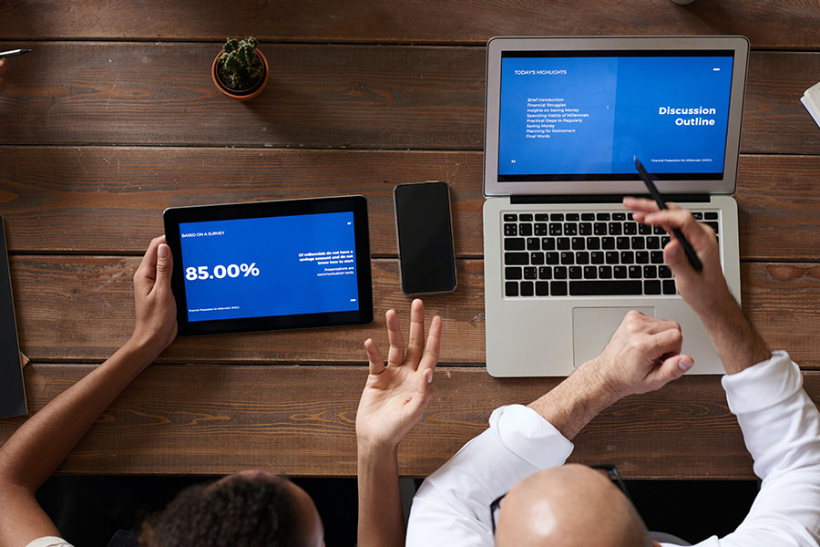 People Working on Computer and Tablet